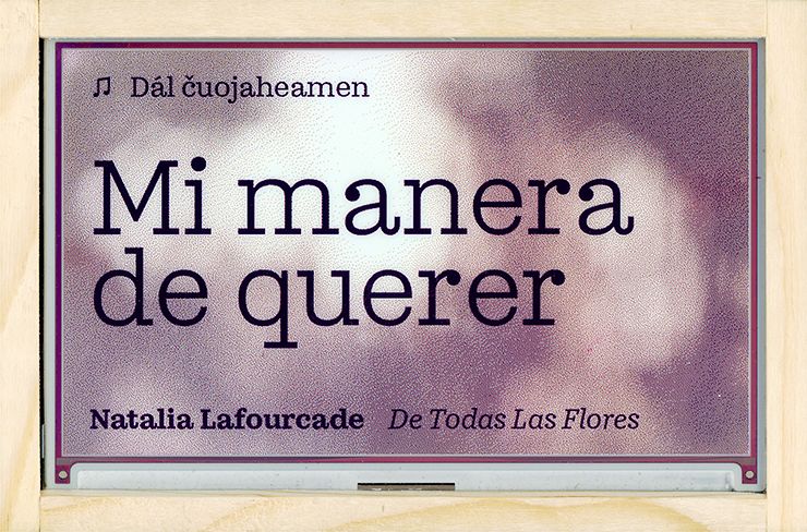 E-ink display in wooden frame displaying the song “Mi manera de querer” by Natalia Lafourcade being played through the multimedia system.