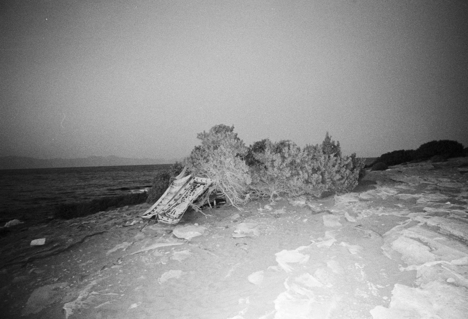 Over the last two days, I started feeling more exhausted. The humidity from the rains made the climate harsher, and headaches became common. The terrain is always wet, especially in early mornings. I am waiting for the sun to come in order to dry some sand around me.   I slept the last few days in Talos because Hank does not feel ready to follow the path for Kambai, and I haven’t seen Pavlos or his girlfriend. Those who manage to stay here all year round amaze me. Especially when there is a storm or strong winds, I find it very harsh and challenging. The people I meet possess a quiet certainty in their movements; they know exactly what to do and where to go, with an amazing simplicity in their actions.